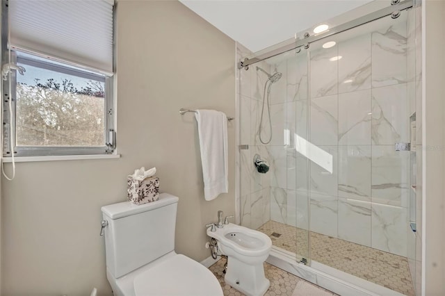 full bath with a bidet, a shower stall, and toilet