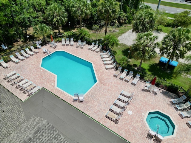 2040 Royal Bay Blvd Unit 30, Kissimmee, FL 34746 - community pool with a patio area and fence