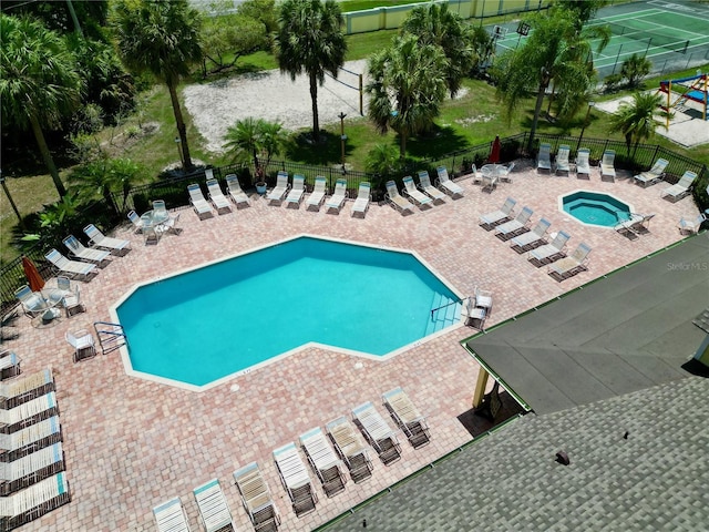 2040 Royal Bay Blvd Unit 30, Kissimmee, FL 34746 - community pool with a patio area and fence
