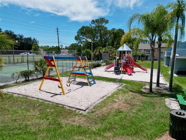 2040 Royal Bay Blvd Unit 30, Kissimmee, FL 34746 - community jungle gym with a lawn and fence