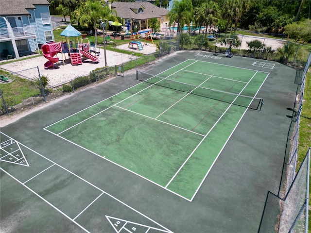 2040 Royal Bay Blvd Unit 30, Kissimmee, FL 34746 - view of sport court with playground community, fence, and shuffleboard
