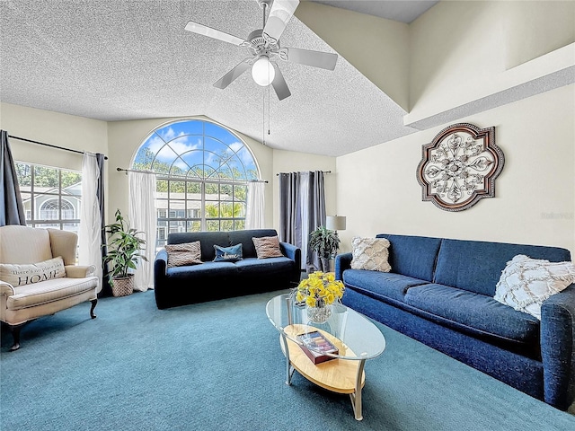 2040 Royal Bay Blvd Unit 30, Kissimmee, FL 34746 - living area with ceiling fan, carpet floors, a textured ceiling, and vaulted ceiling