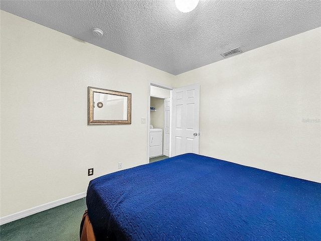 2040 Royal Bay Blvd Unit 30, Kissimmee, FL 34746 - carpeted bedroom featuring washer / dryer, baseboards, visible vents, and a textured ceiling