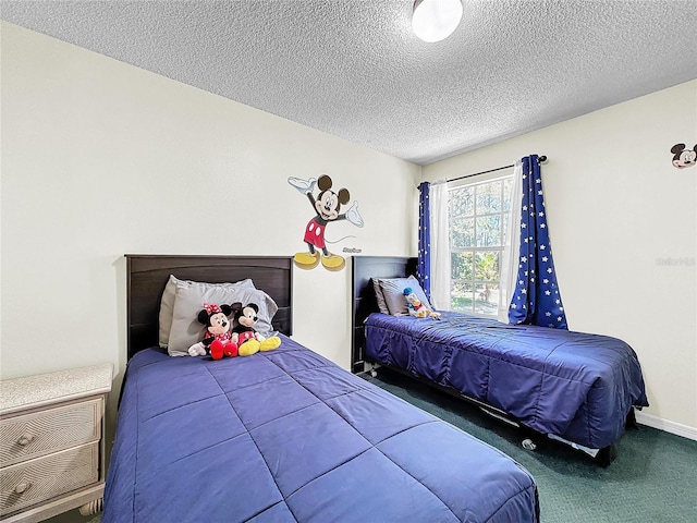 2040 Royal Bay Blvd Unit 30, Kissimmee, FL 34746 - carpeted bedroom featuring a textured ceiling
