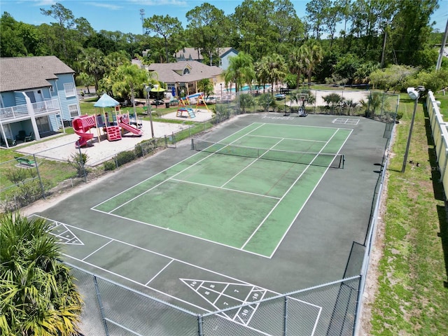 2040 Royal Bay Blvd Unit 30, Kissimmee, FL 34746 - view of tennis court with playground community and fence