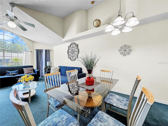 2040 Royal Bay Blvd Unit 30, Kissimmee, FL 34746 - carpeted dining room with lofted ceiling, a chandelier, ceiling fan, and a textured ceiling