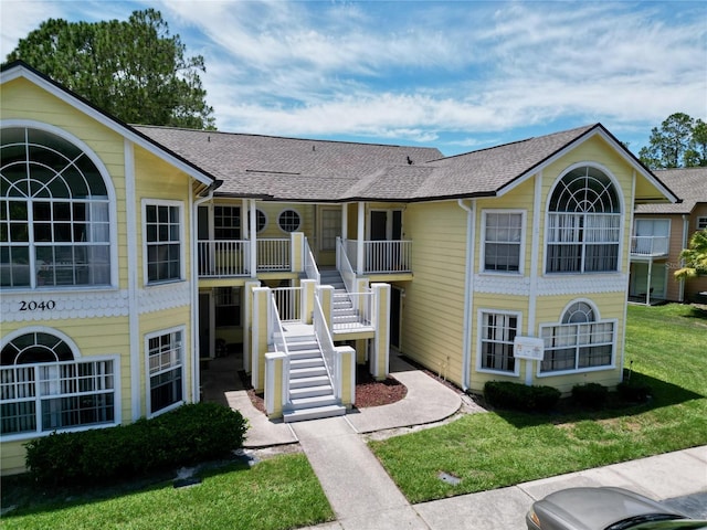 2040 Royal Bay Blvd Unit 30, Kissimmee, FL 34746 - view of building exterior with stairway