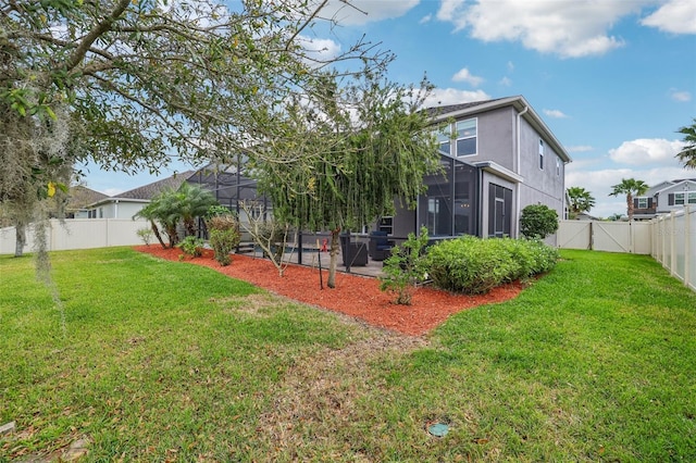 view of yard featuring a patio area and a fenced backyard