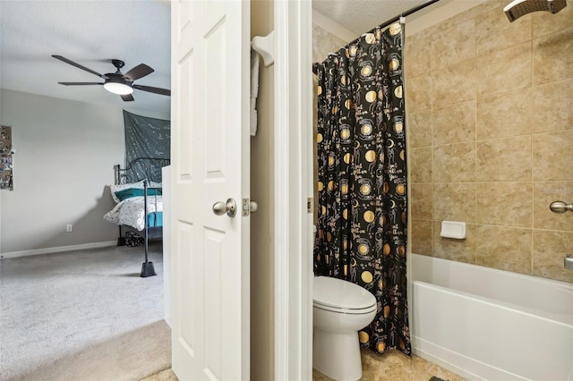 full bathroom with ensuite bathroom, shower / bath combo, toilet, and a ceiling fan