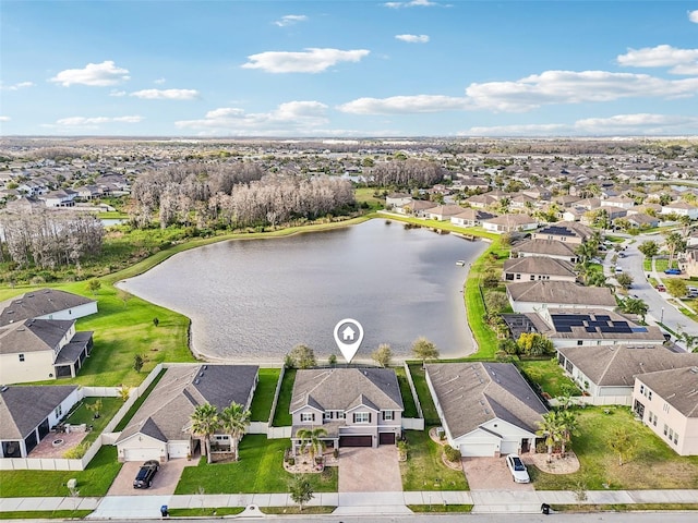 aerial view featuring a residential view and a water view