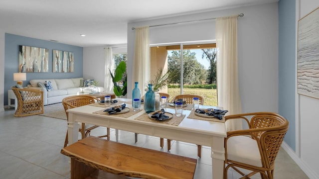 dining room featuring baseboards