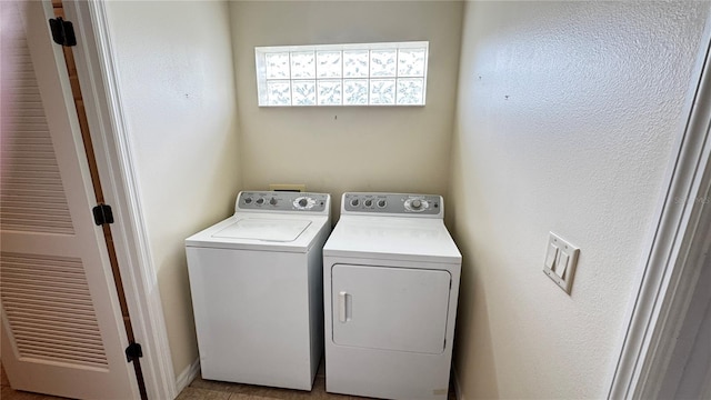 laundry room featuring laundry area and separate washer and dryer