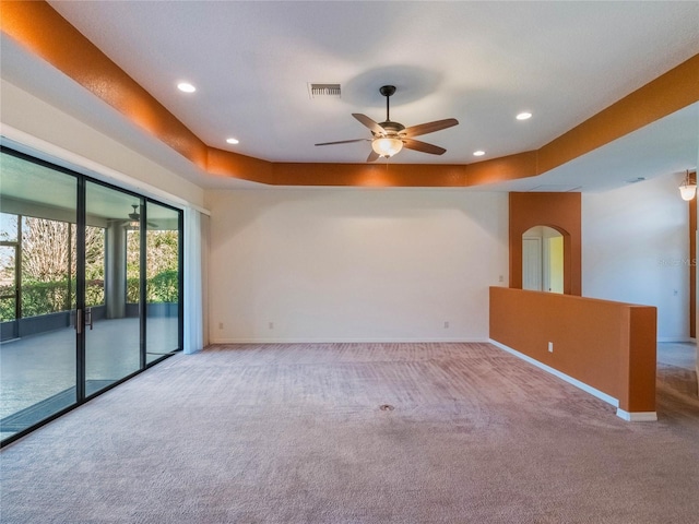 27307 Pine Straw Rd, Leesburg, FL 34748 - spare room with carpet, baseboards, visible vents, a ceiling fan, and recessed lighting