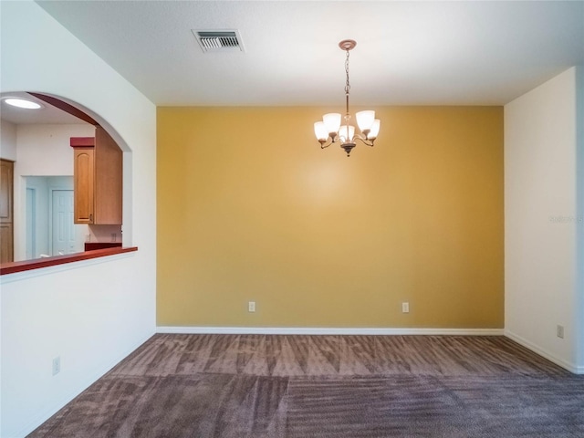 27307 Pine Straw Rd, Leesburg, FL 34748 - carpeted empty room with visible vents, arched walkways, a notable chandelier, and baseboards