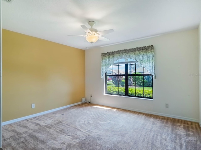27307 Pine Straw Rd, Leesburg, FL 34748 - carpeted spare room with baseboards and ceiling fan