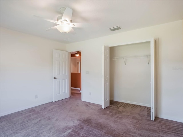 27307 Pine Straw Rd, Leesburg, FL 34748 - unfurnished bedroom with carpet flooring, visible vents, a closet, and ceiling fan