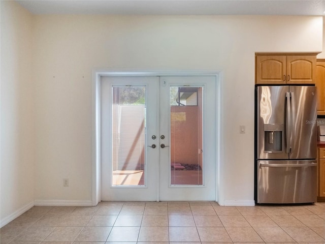 27307 Pine Straw Rd, Leesburg, FL 34748 - doorway to outside with a wealth of natural light, french doors, baseboards, and light tile patterned flooring
