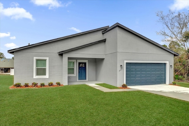 view of front facade with driveway, a front lawn, an attached garage, and stucco siding