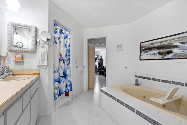 bathroom featuring a textured ceiling, a shower with shower curtain, visible vents, vanity, and a jetted tub