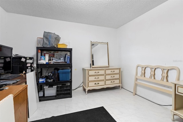 bedroom with a textured ceiling