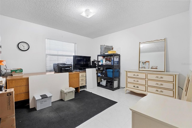 office space with a textured ceiling