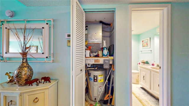 pantry featuring electric water heater