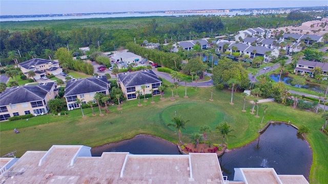 aerial view featuring a water view and a residential view