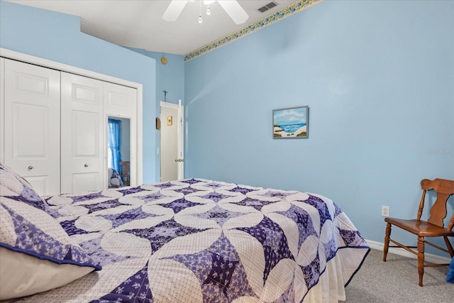 carpeted bedroom with a ceiling fan, a closet, visible vents, and baseboards