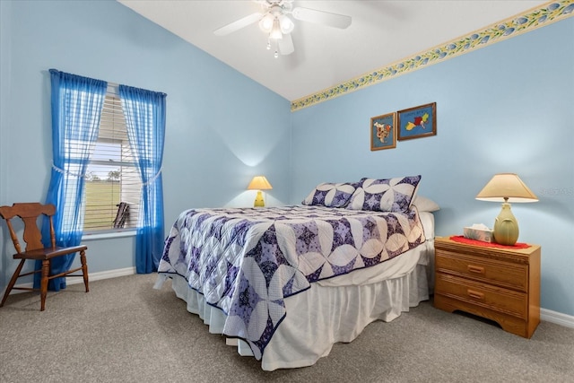 carpeted bedroom featuring vaulted ceiling, baseboards, and ceiling fan