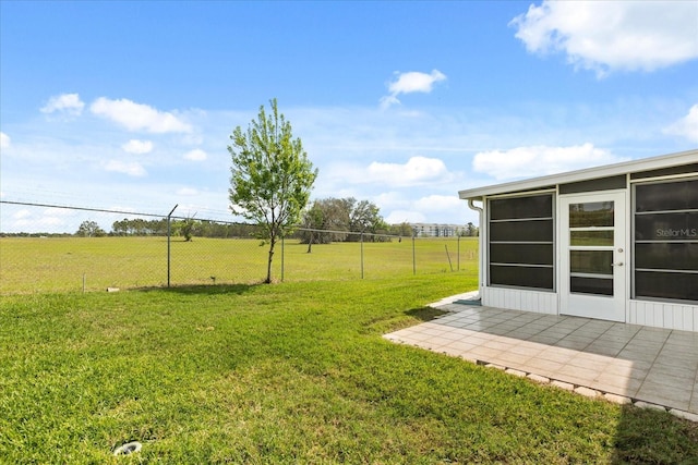 view of yard with a patio area and fence