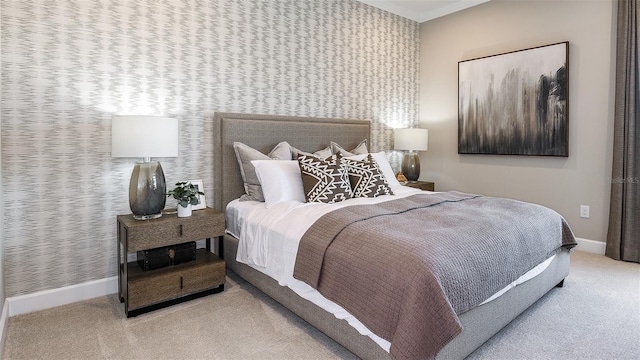 bedroom featuring baseboards and carpet flooring