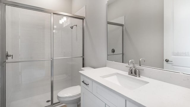 5641 Nevis Ter, Kissimmee, FL 34758 - full bathroom with toilet, a shower stall, and vanity