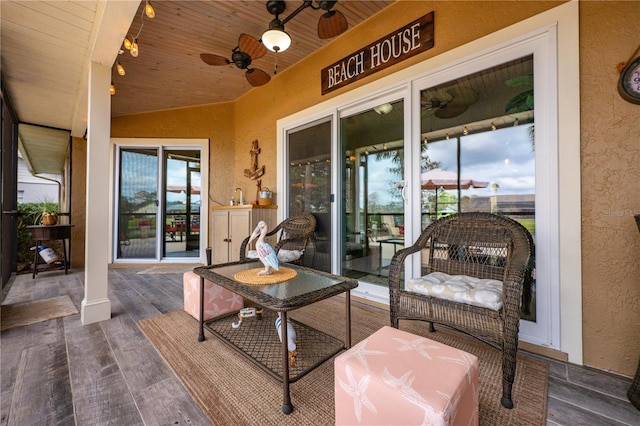 exterior space featuring a ceiling fan