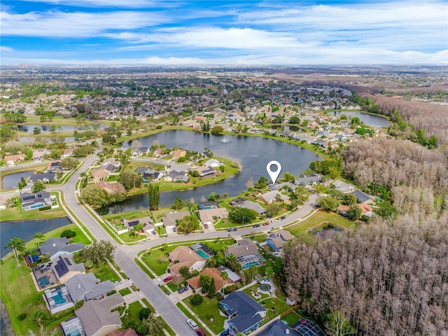 bird's eye view with a residential view and a water view