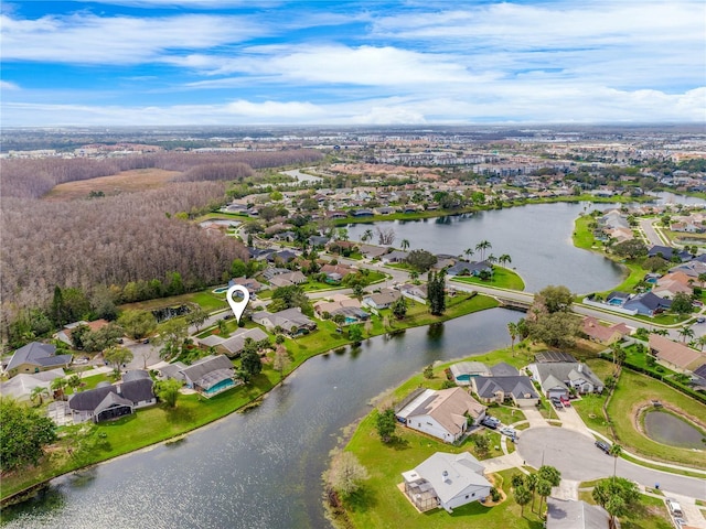 bird's eye view with a water view and a residential view