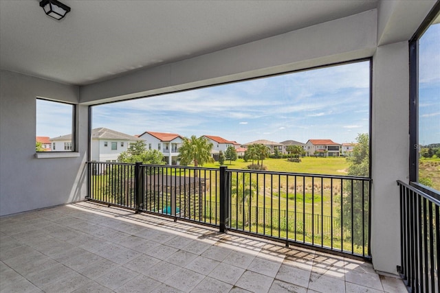 15724 Cutter Sail Pl, Winter Garden, FL 34787 - unfurnished sunroom with a residential view
