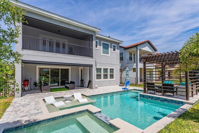 15724 Cutter Sail Pl, Winter Garden, FL 34787 - rear view of property featuring stucco siding, a pool with connected hot tub, a patio area, fence, and a pergola