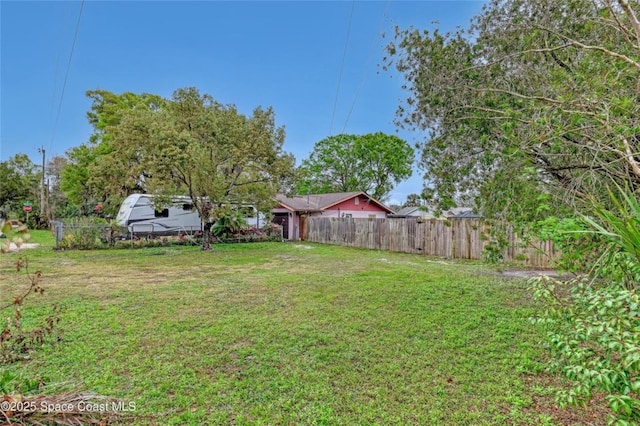 view of yard with fence