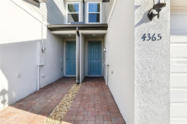 4365 Switchgrass Ln, Saint Cloud, FL 34772 - entrance to property with stucco siding