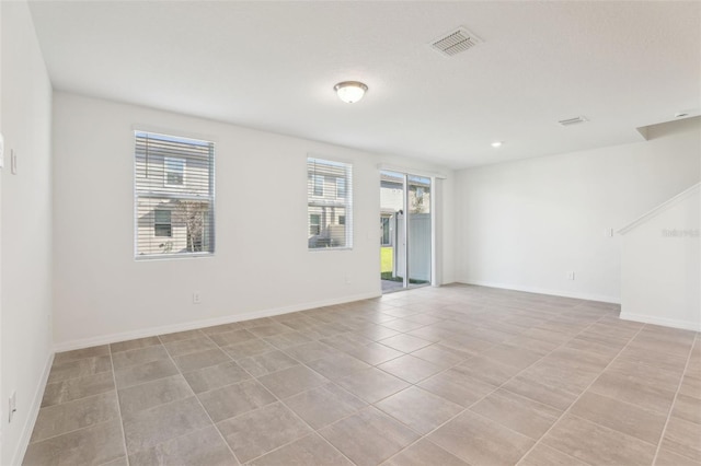 4365 Switchgrass Ln, Saint Cloud, FL 34772 - spare room featuring recessed lighting, light tile patterned floors, visible vents, and baseboards