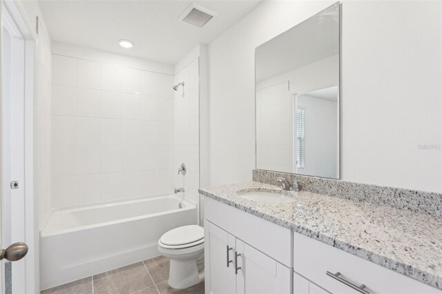 4365 Switchgrass Ln, Saint Cloud, FL 34772 - full bath with visible vents, toilet, vanity, shower / bathtub combination, and tile patterned floors