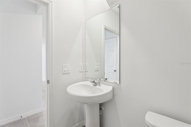 4365 Switchgrass Ln, Saint Cloud, FL 34772 - half bathroom with toilet and baseboards