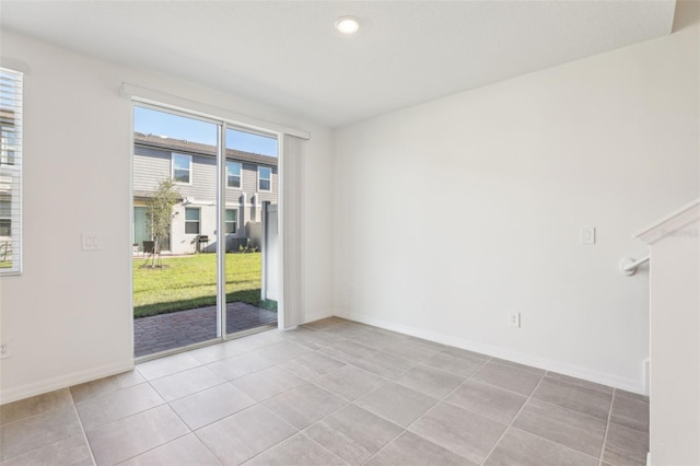 4365 Switchgrass Ln, Saint Cloud, FL 34772 - unfurnished room with light tile patterned floors and baseboards