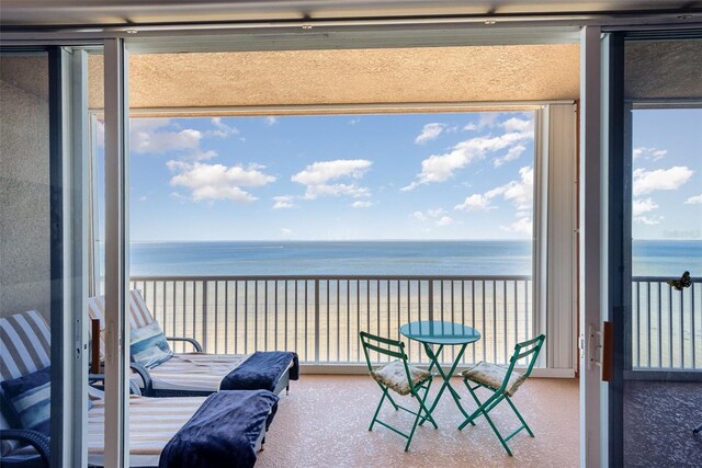 3203 S Washington Ave Unit 1002, Titusville, FL 32780 - balcony featuring a view of the beach and a water view