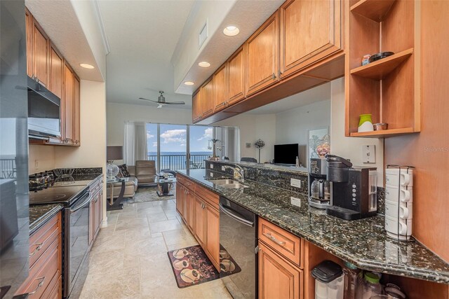 3203 S Washington Ave Unit 1002, Titusville, FL 32780 - kitchen with electric range, brown cabinets, open floor plan, stainless steel dishwasher, and a sink