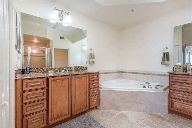 3203 S Washington Ave Unit 1002, Titusville, FL 32780 - full bathroom with a garden tub, vanity, visible vents, ornamental molding, and a shower stall