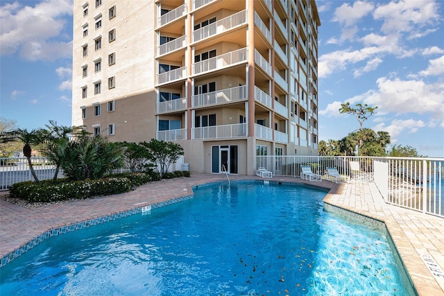 3203 S Washington Ave Unit 1002, Titusville, FL 32780 - community pool featuring fence