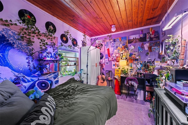bedroom with wood finished floors and wood ceiling