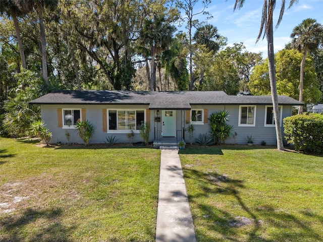 ranch-style house with a front yard