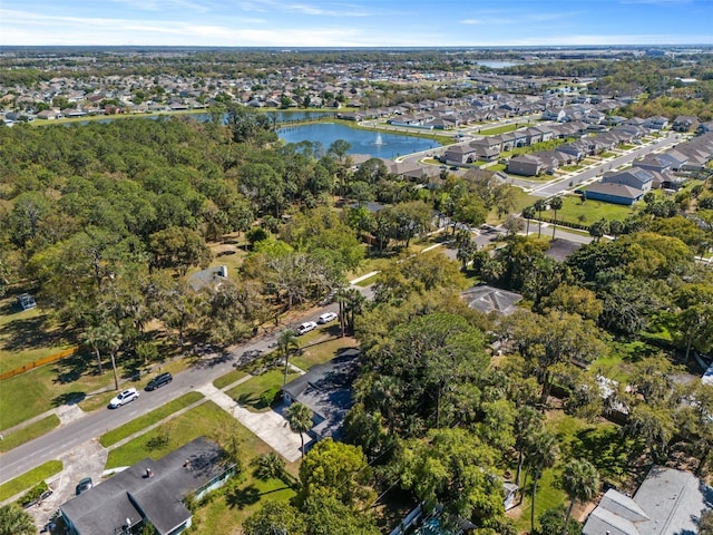 birds eye view of property featuring a residential view and a water view